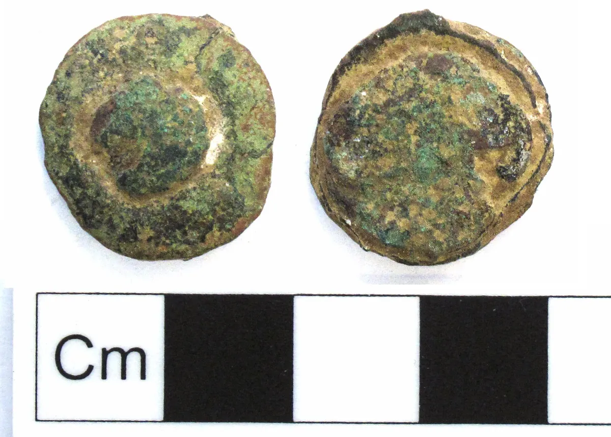 Copper button — a common find on the cloth