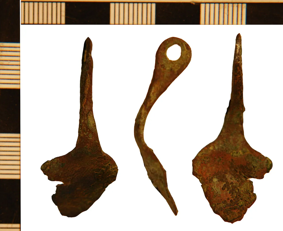 A complex cast non-ferrous mount before cleaning