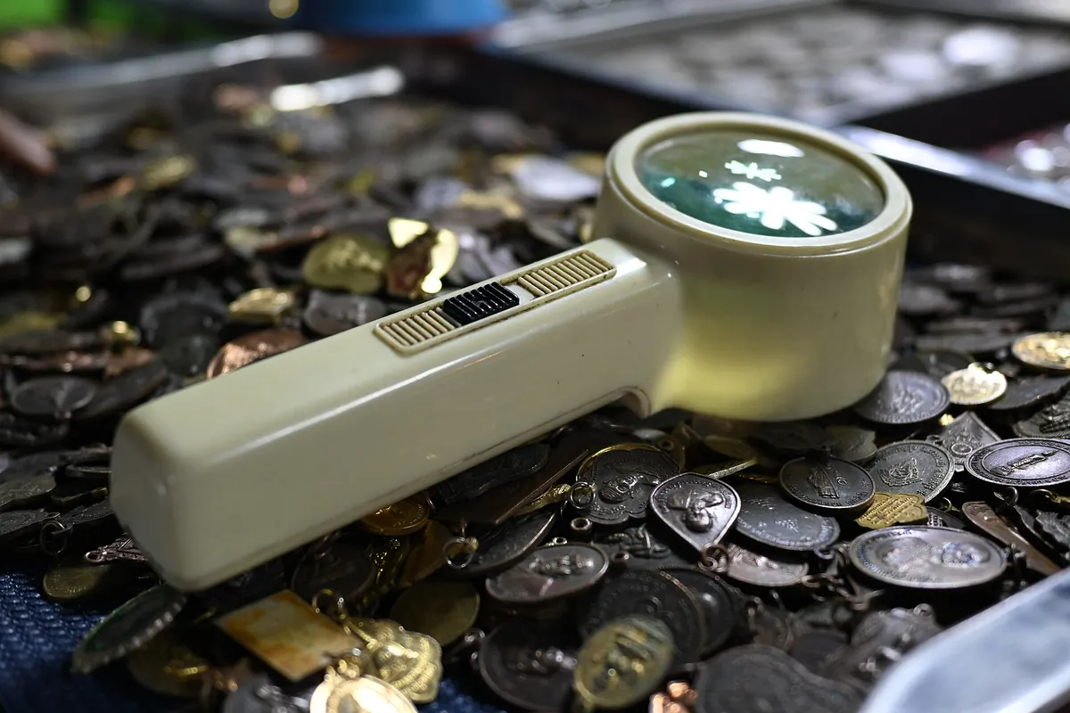 Examining letters and relief under a loupe